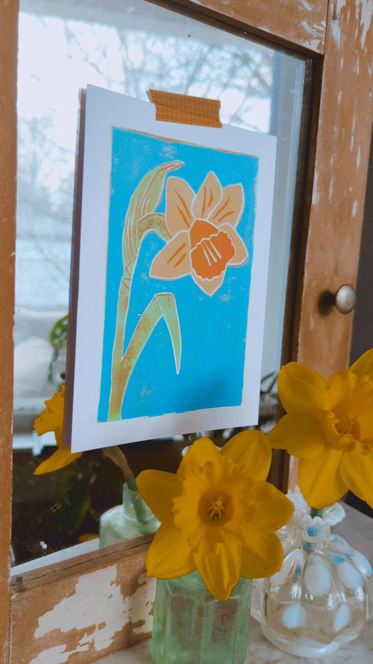 daffodil print w/ blue background